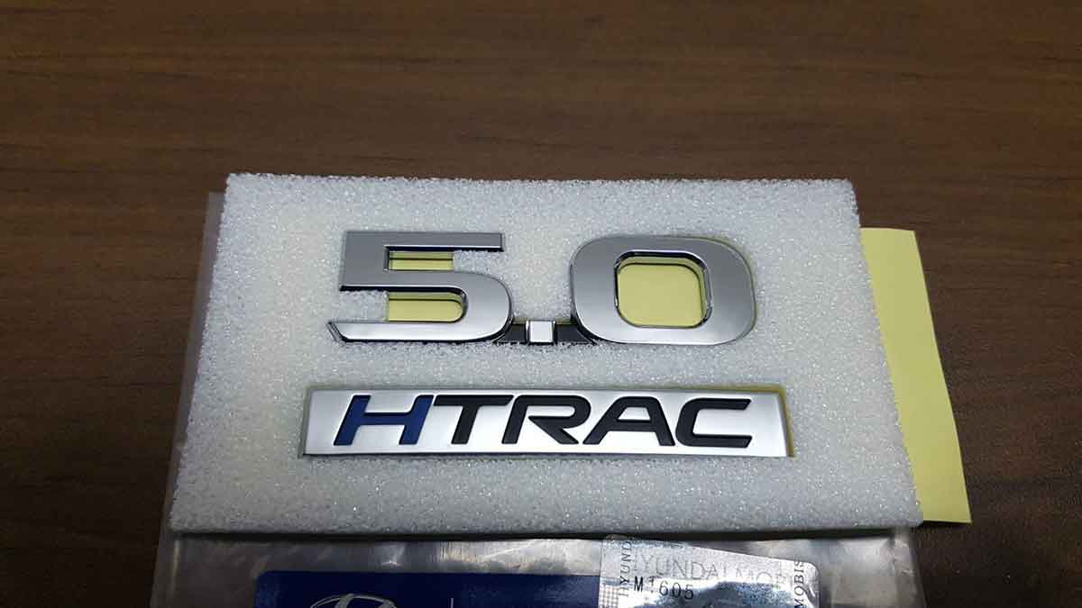 Genesis Motors 5.0 HTRAC Badge